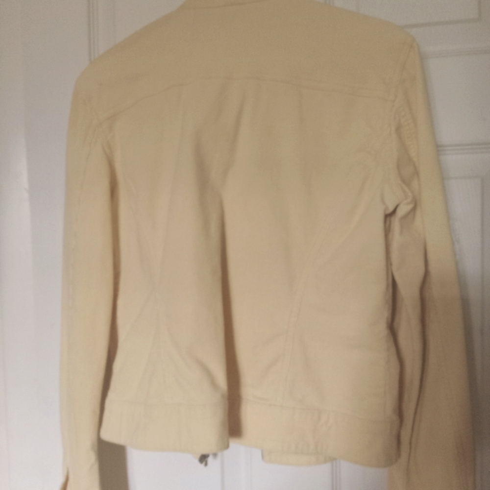 Soft material Yellow Jacket Brand is JLo. Size Large, but runs small.